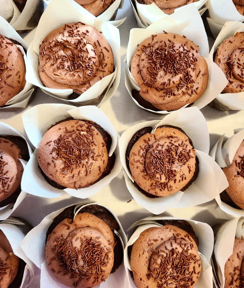 Hive Bakeshop's chocolate cupcakes with chocolate buttercream and sprinkles