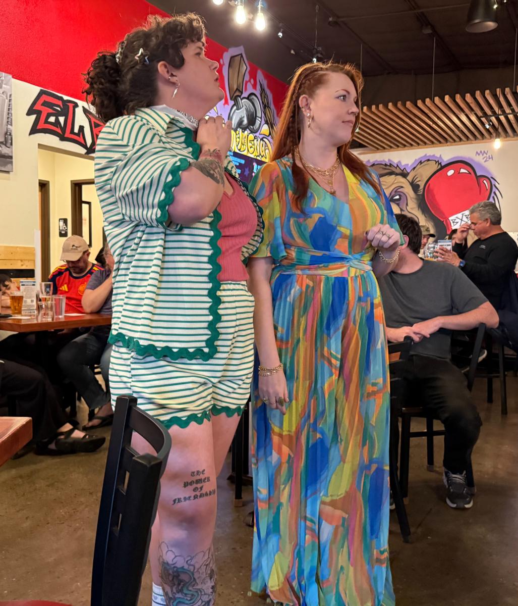 Evening Star Barron and Katie Farmin perform during "Comedy of Errors" Bard Crawl to tables of audience members.