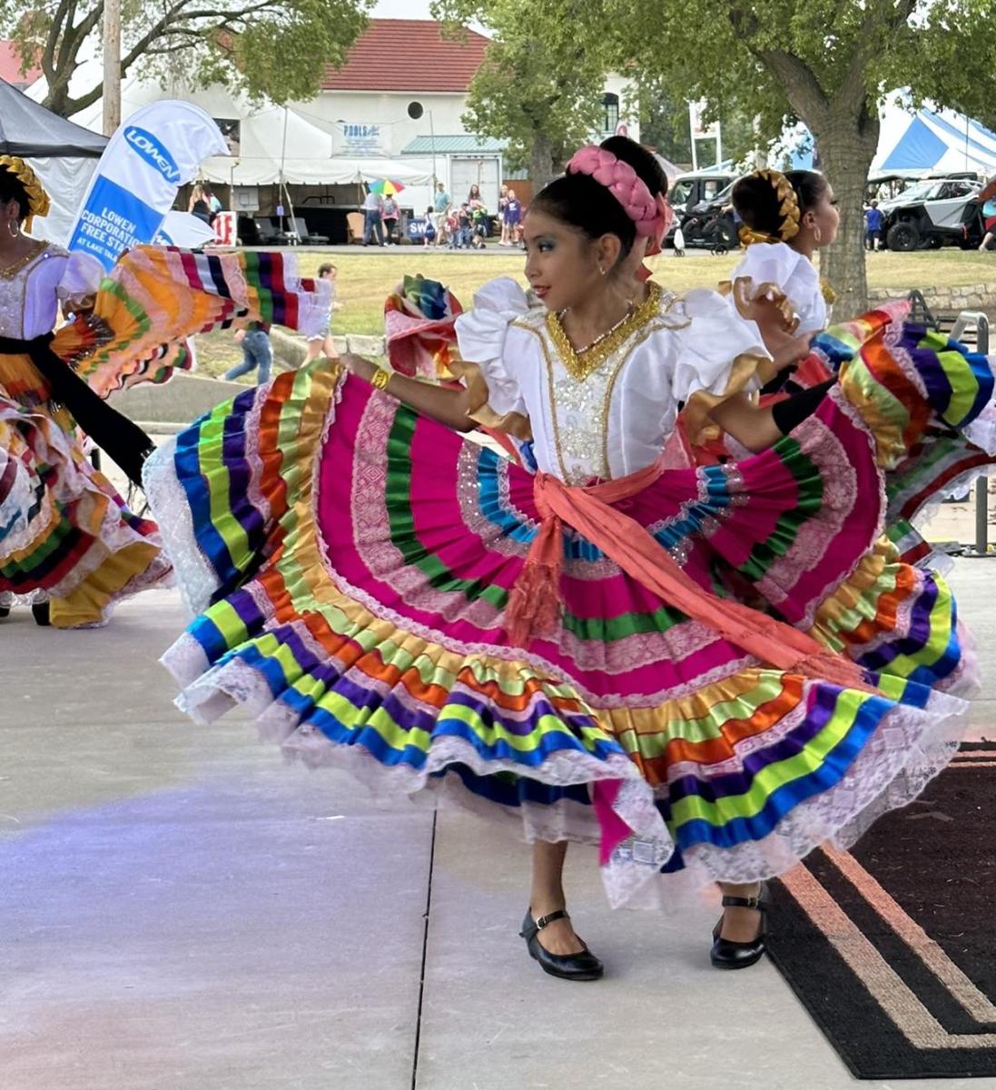 A woman dances at Latin Fest