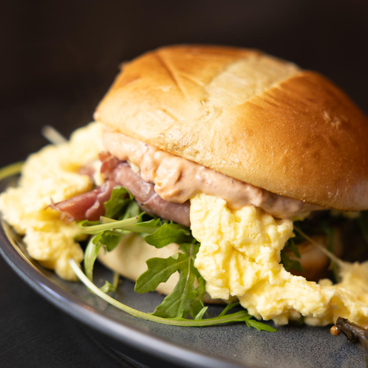 A close-up shot of a breakfast sandwich from Brekki Brekki.