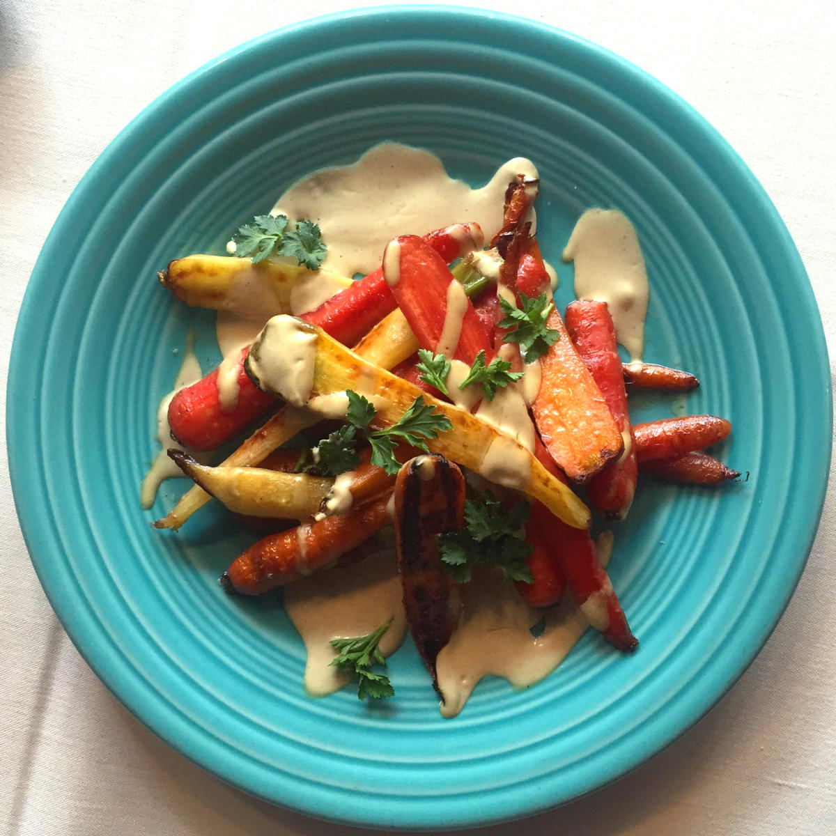 Plate of carrots covered in a sauce at Bramble and Hare