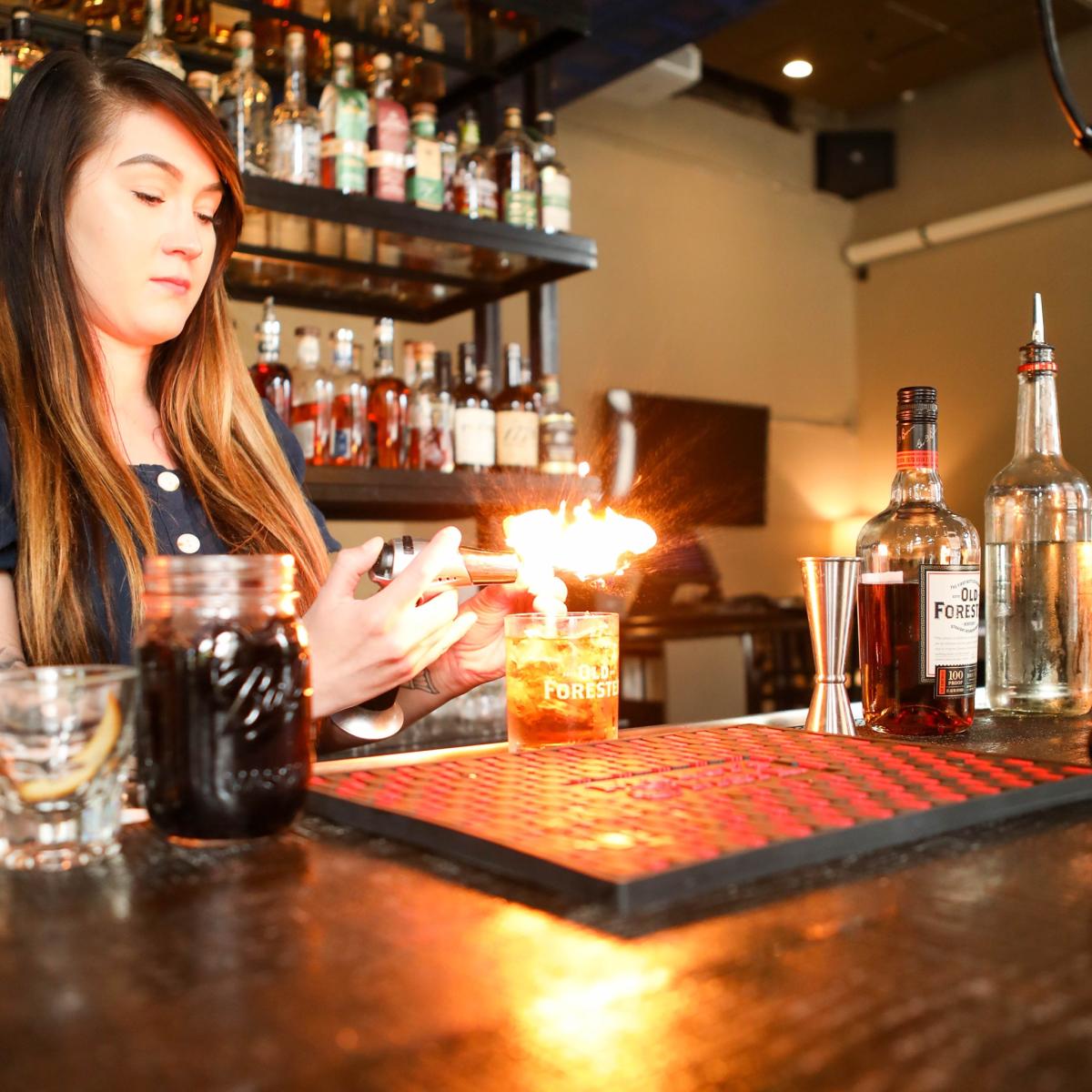 jade making a cocktail_smoke justis