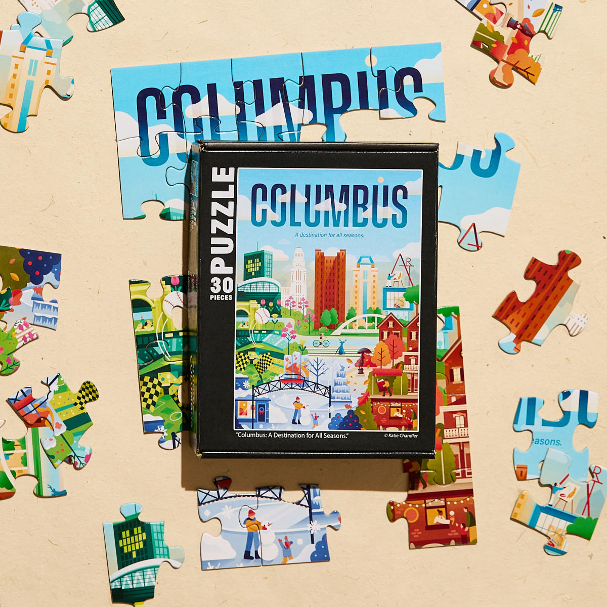 30 piece puzzle with a Columbus cartoon design showcasing all four seasons