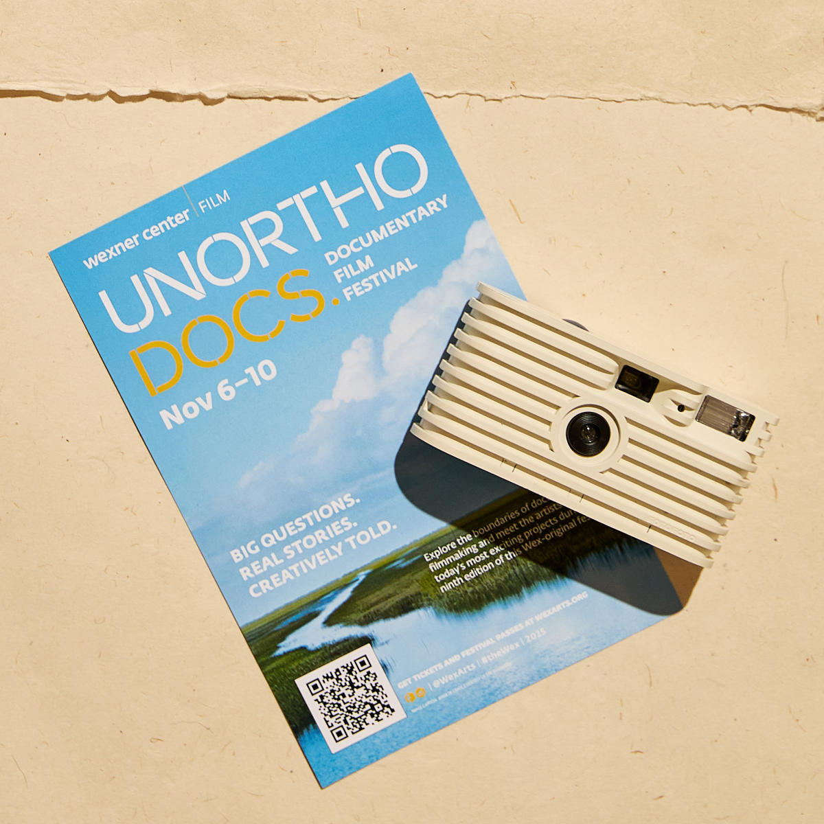 "Unortho Docs" Documentary Film Festival flyer with camera