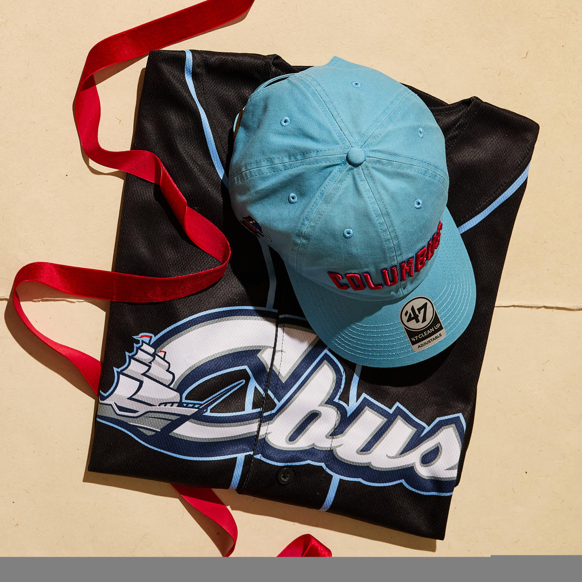 Columbus Clippers baseball hat and jersey