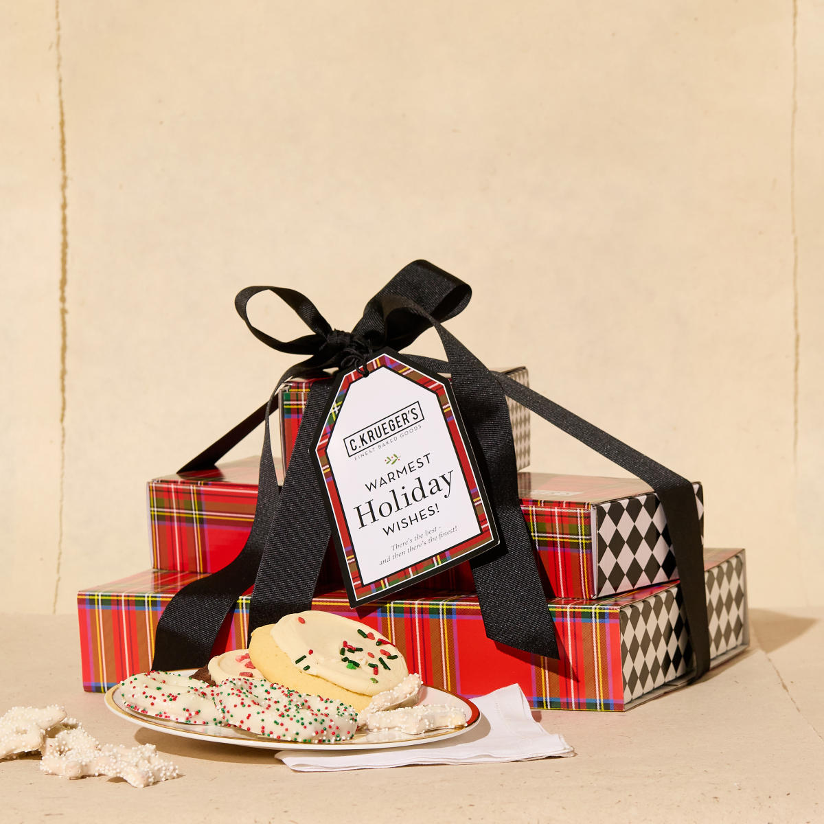 Box of cookies and chocolate covered pretzels from C. Krueger's