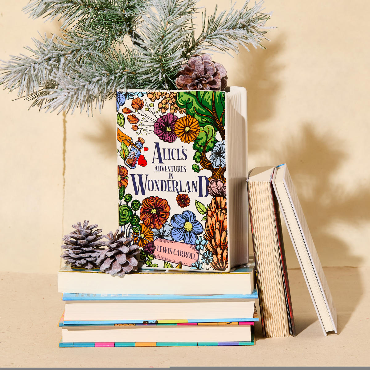 Flower vase that looks like "Alice's Adventures in Wonderland" book