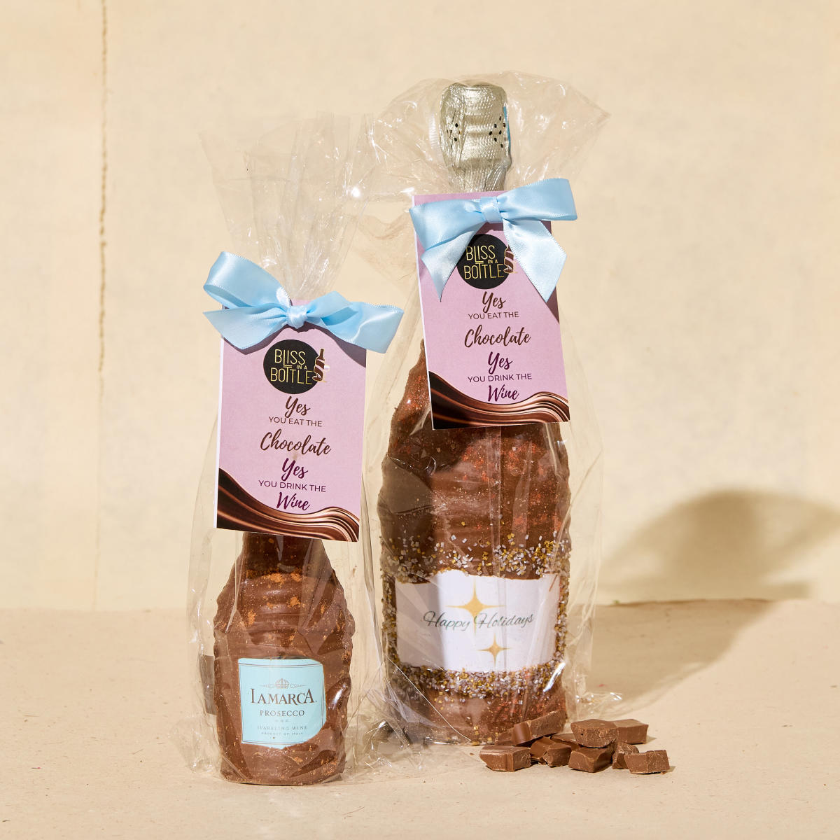 Large and mini wine bottles covered in chocolate from Bliss in a Bottle