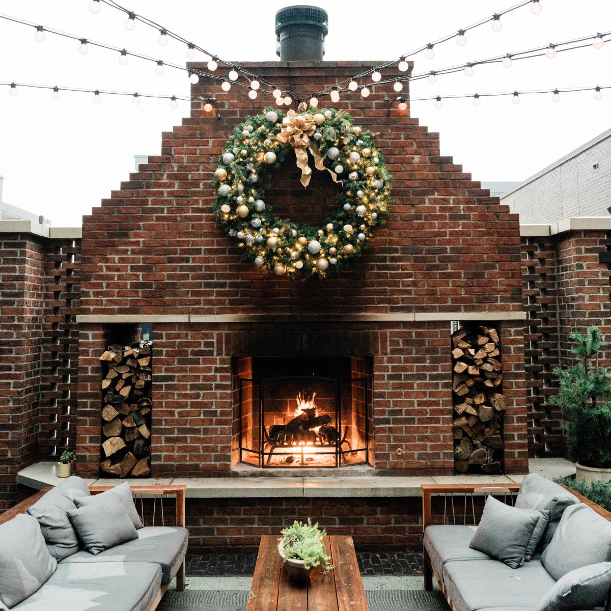 Ourdoor fireplace on The Junto's rooftop