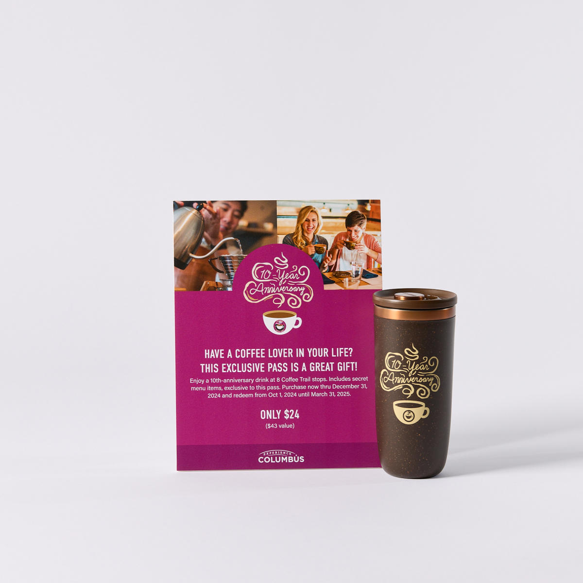 Sign promoting the Columbus Coffee Trail 10-Year Anniversary Pass and a brown Anniversary tumbler