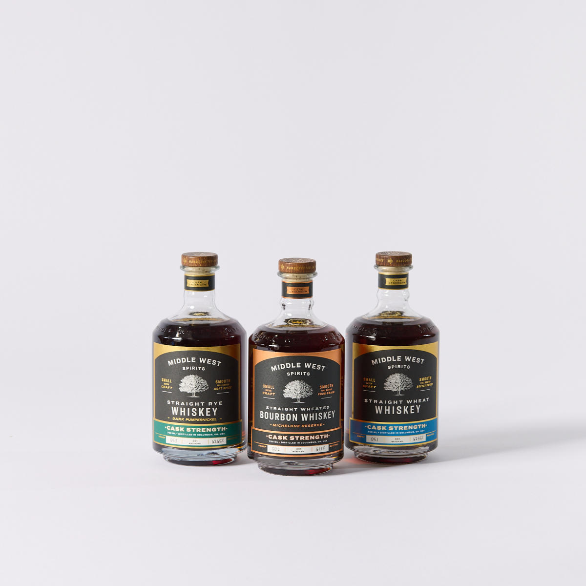 Three different bottles of whiskey from Middle West Spirits
