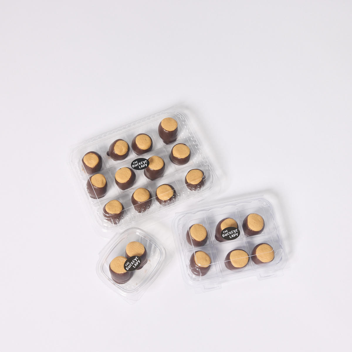 Three boxes of buckeyes from The Buckeye Lady — a box of 2, 6 and 12