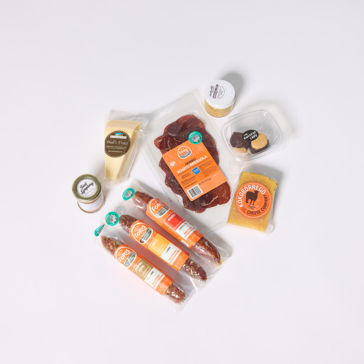 Assortment of food items included in Foris Extraordinary Meat's Buckeye Charcuterie Collection
