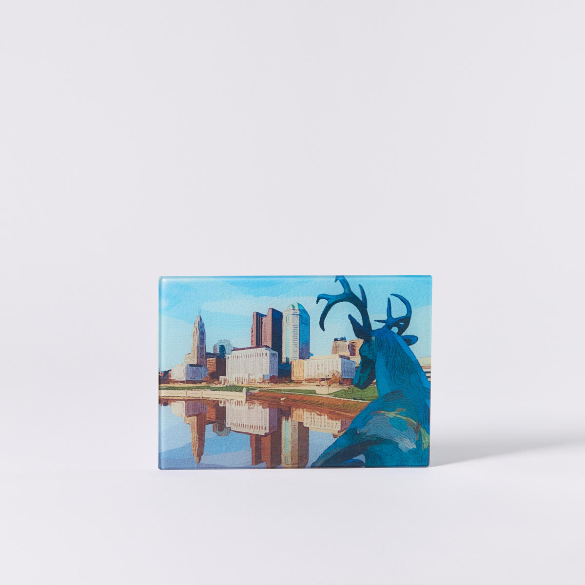 Glass Crudités Board from The Red Stable. Features a deer statue overlooking Scioto River and Columbus skyline