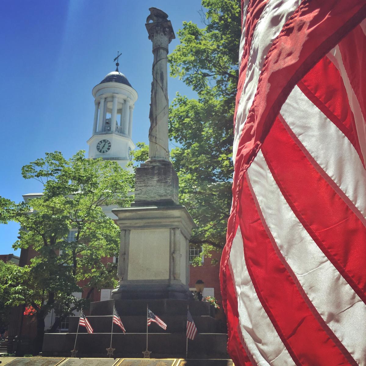 Statue and American Flag In Downtown Carlisle, PA