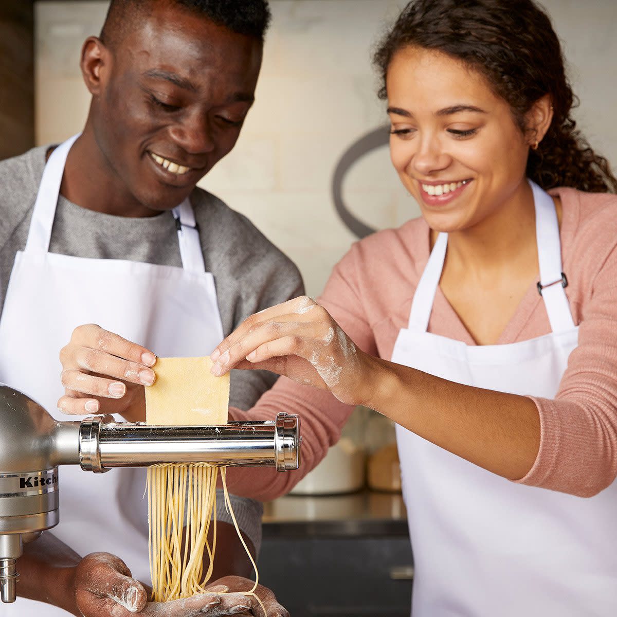 Couple making fresh pasta