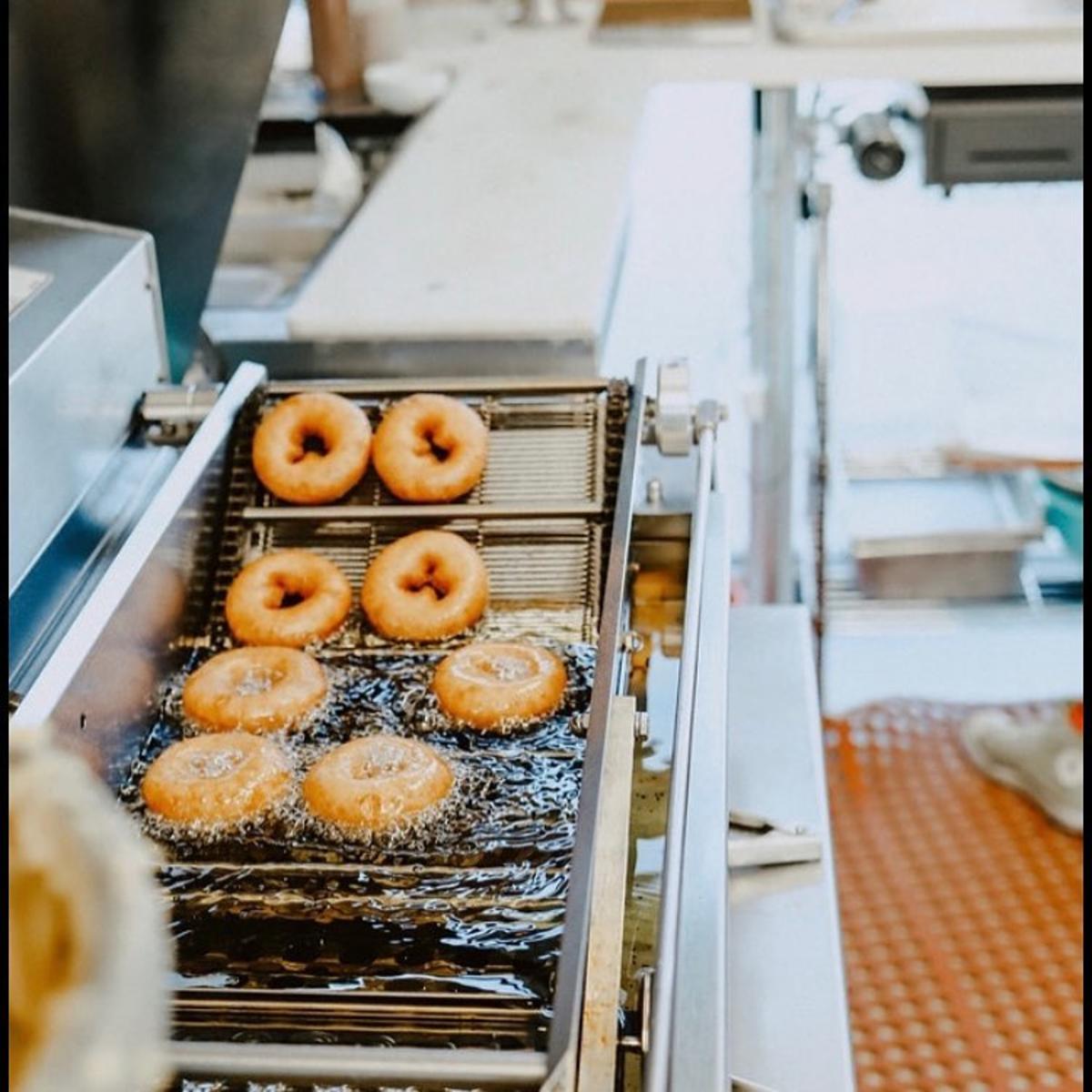 FoCo DoCo donuts in fryer
