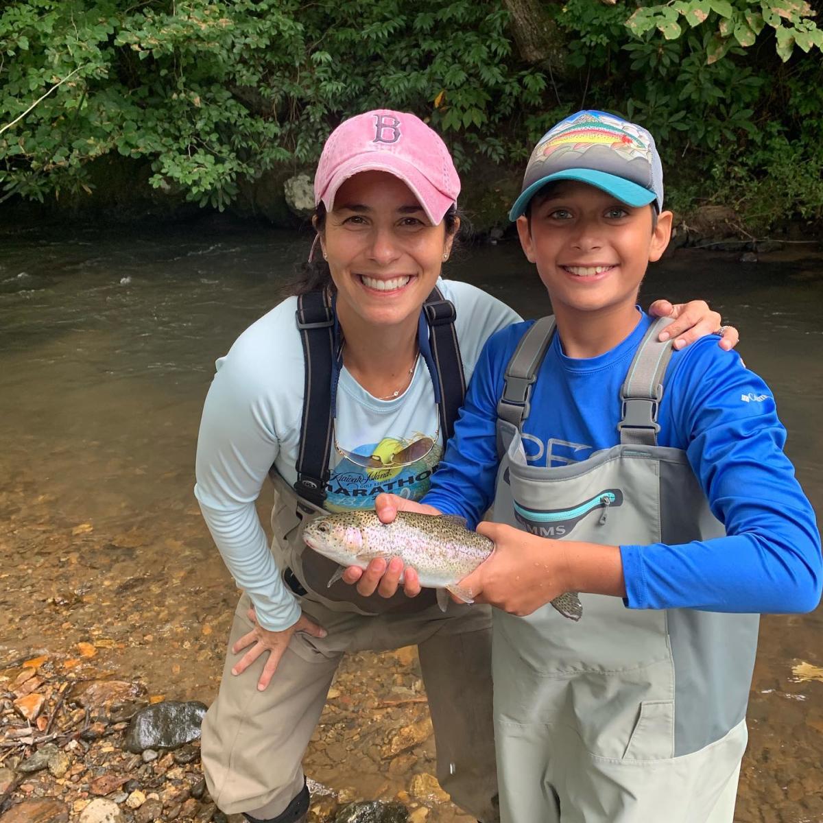 Kid holding trout