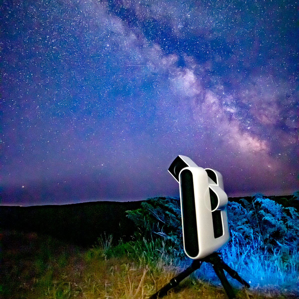 Milky Way Galaxy with telescope in the foreground