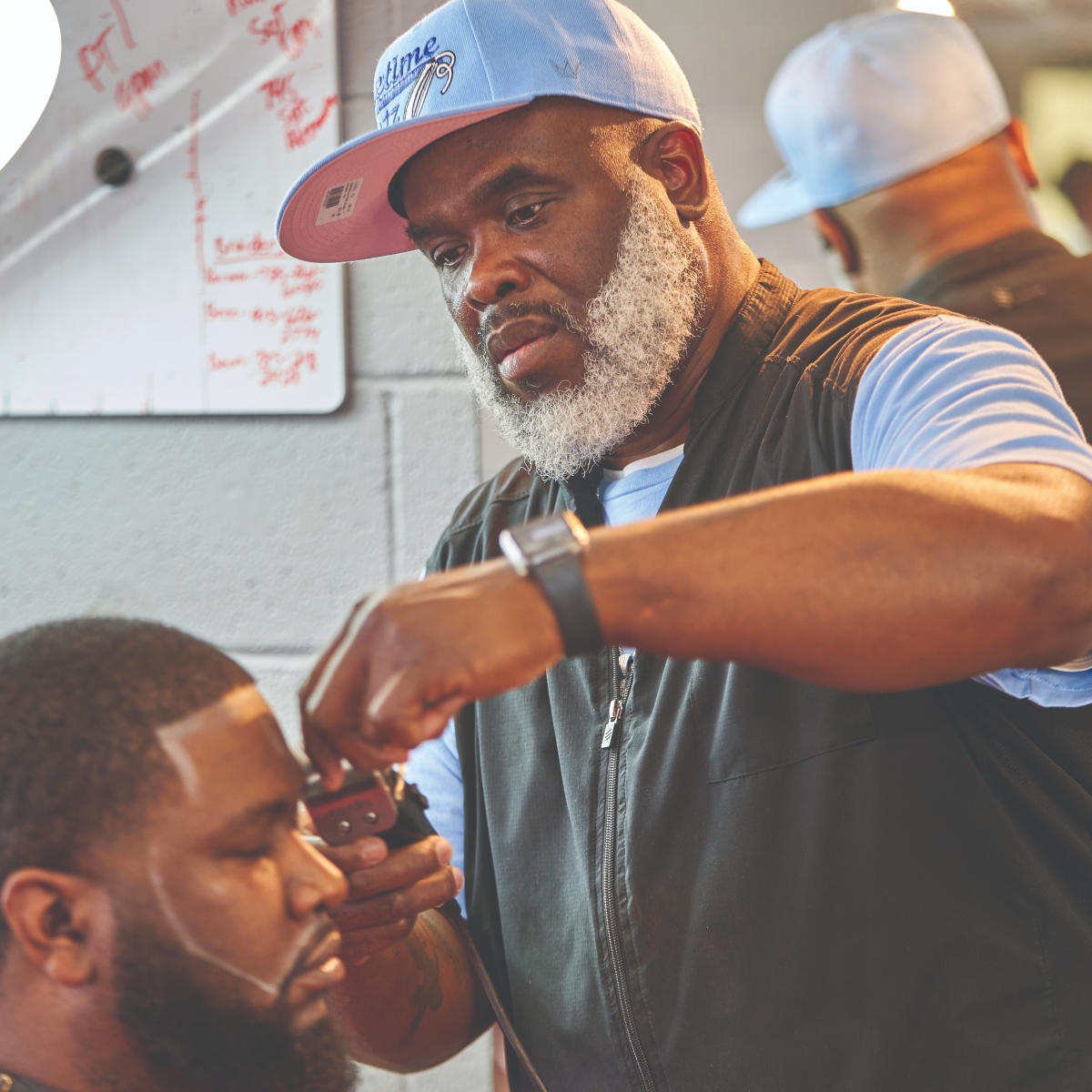 Gametime Barber Jermaine Jackson at Watson's Barbershop in Lawrence Kansas