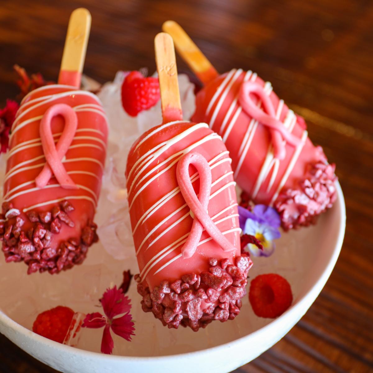 Cake pops decorated in pink for Breast Cancer Awareness month