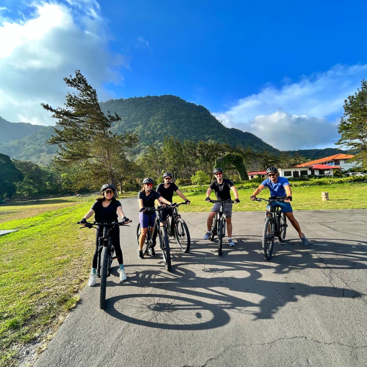 Friends riding bikes in a sunny day at El Valle de Anton