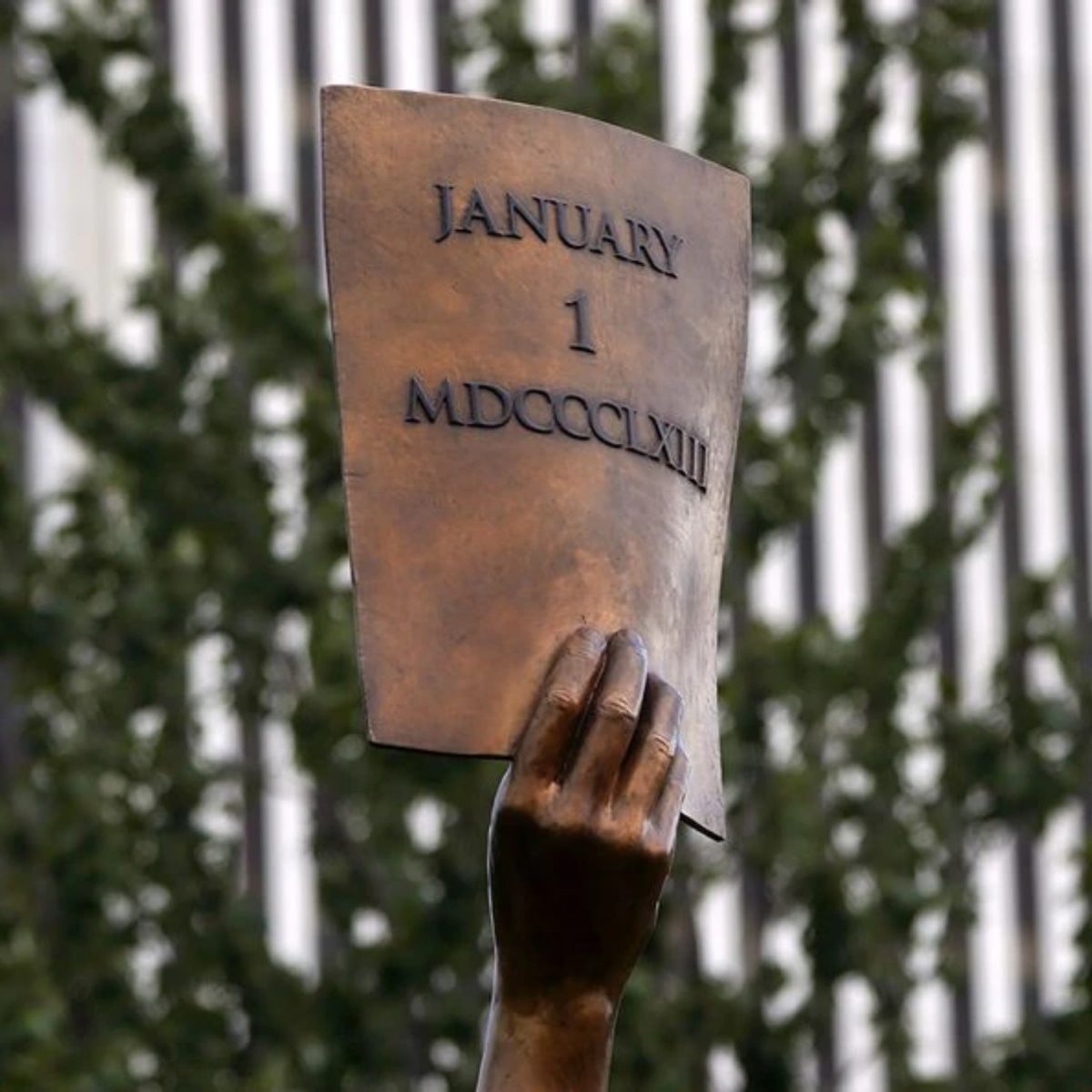 Close up of the document with a date depicted in the Emancipation and Freedom Monument in Richmond, VA