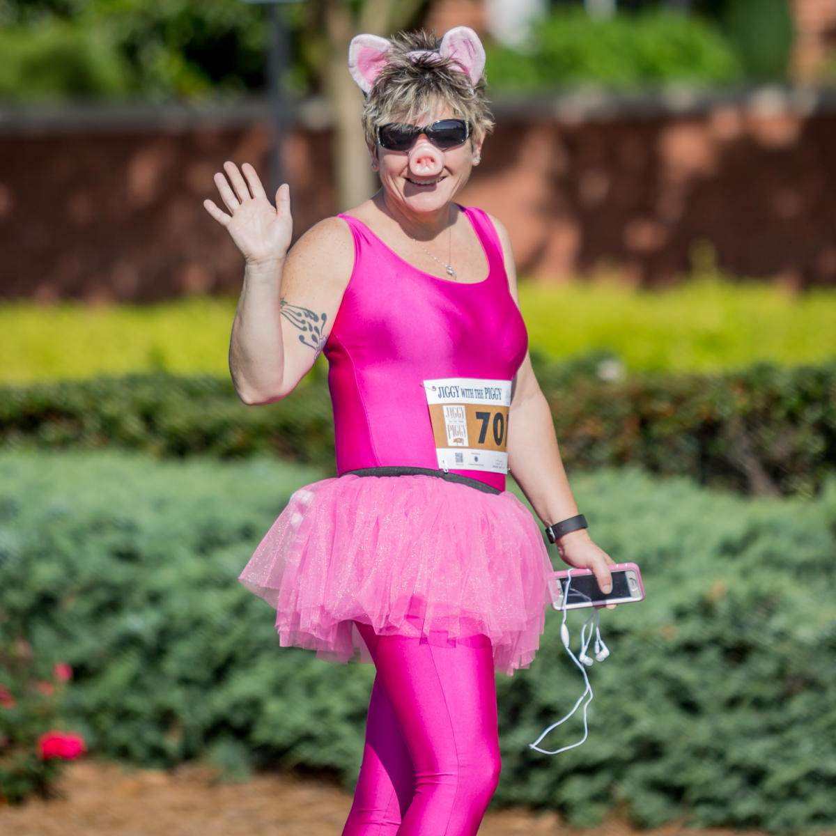 Woman dressed in pig costume running 5k