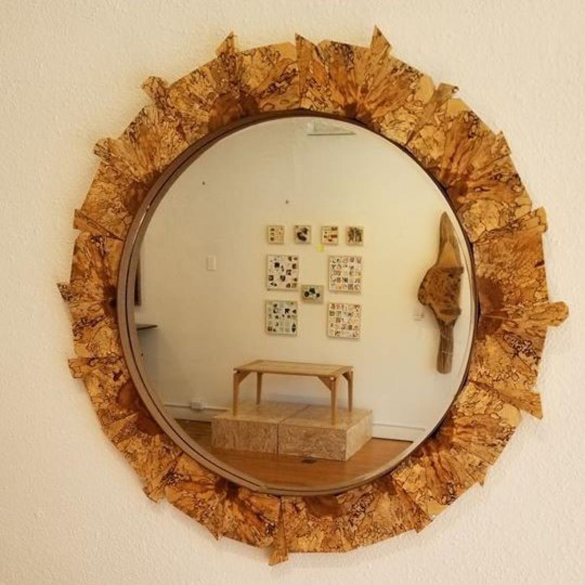 A mirror created by Gallery Q artist, Graham Coulson.