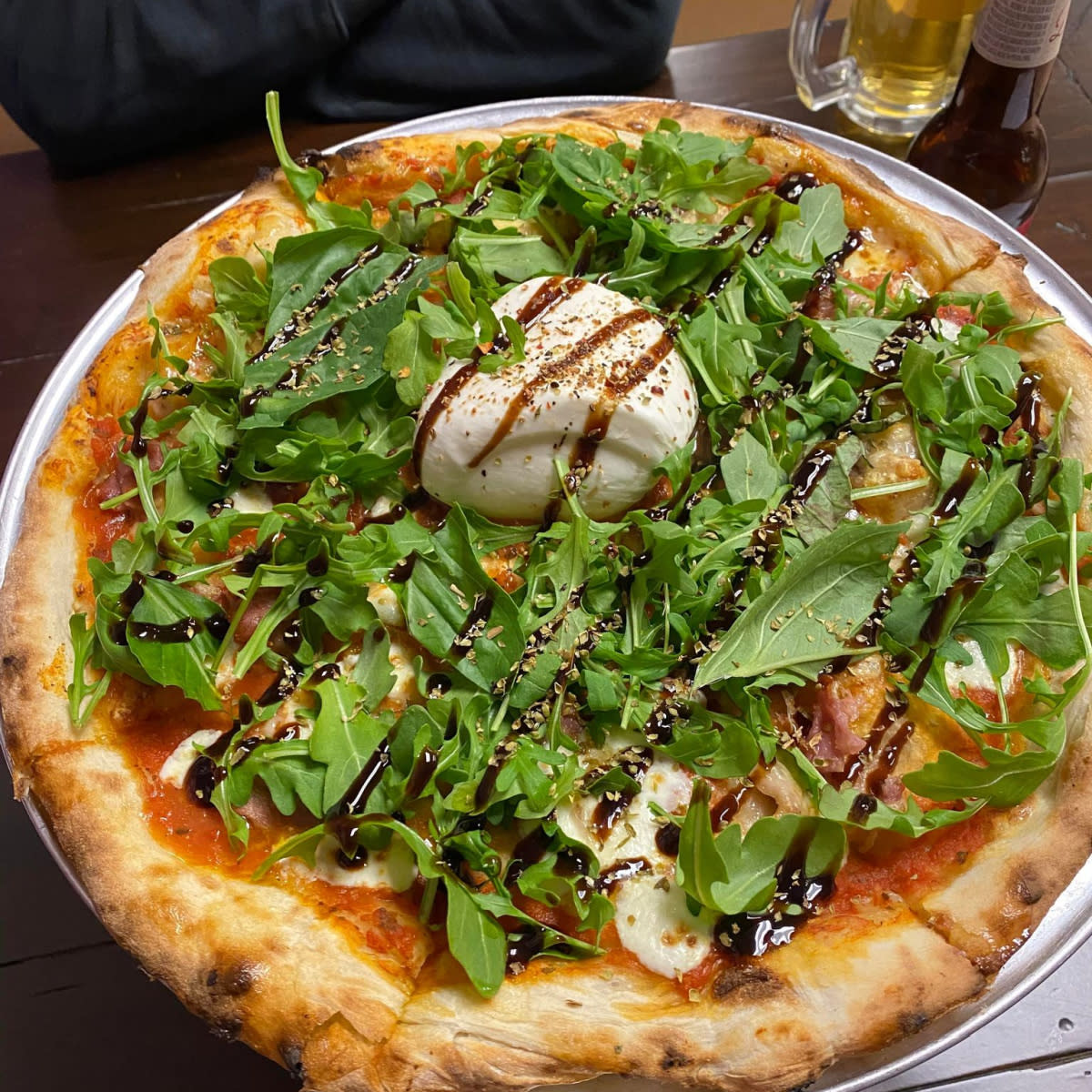 Snag a slice of delicious pizza in the Stevens Point Area, from the Violet Basil.