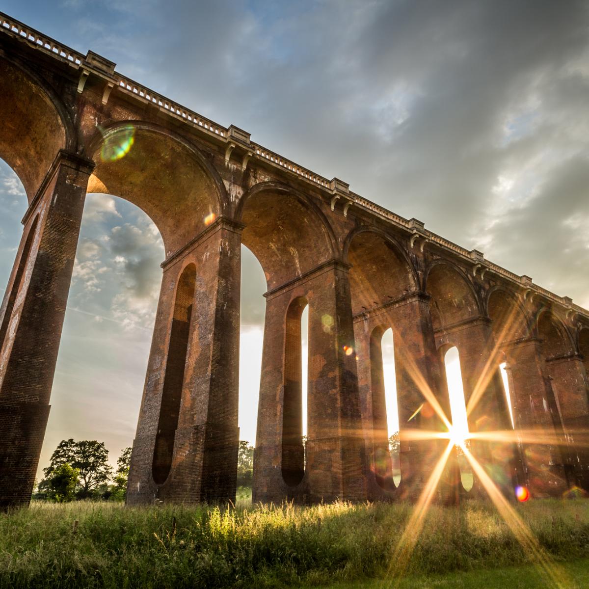 an image of the ouse valley viaduct near Balcombe - a magnificent victorian brick structure with many arches