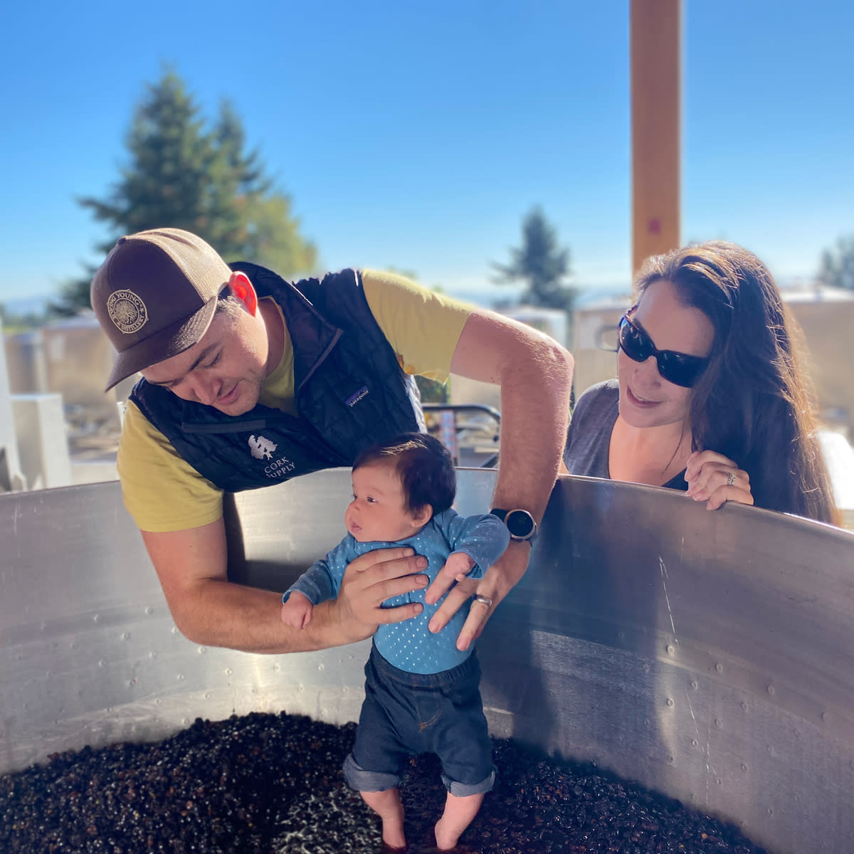Ryan Harvey is the Associate Winemaker at Domaine Drouhin Oregon and his wife, Kateland, is the Director of Sales and Marketing. Pictured here with their daughter, Mila.