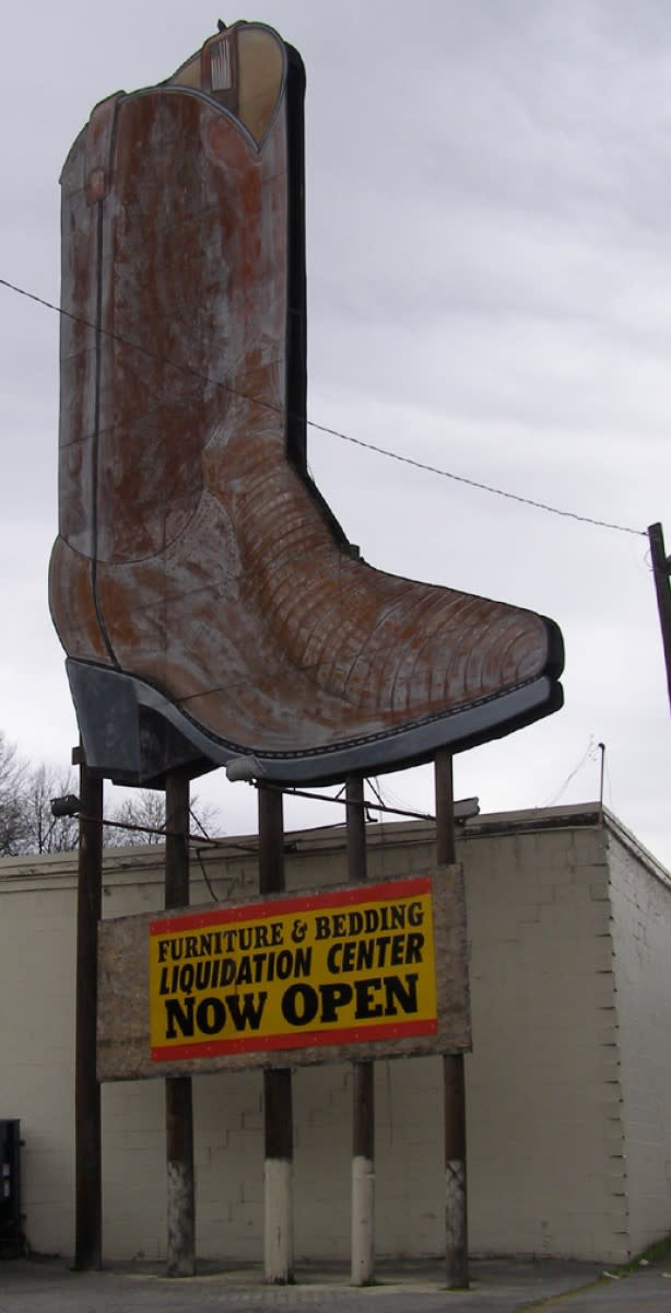 The Acme Boot sign on Boot Hill, Providence Boulevard in Clarksville, in about 2007.