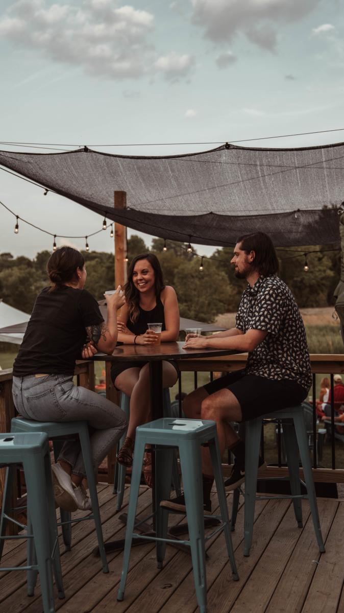 Three People Drinking