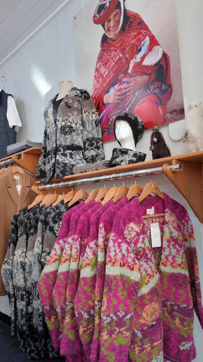 Magenta and grey Alpaca International Sweaters.