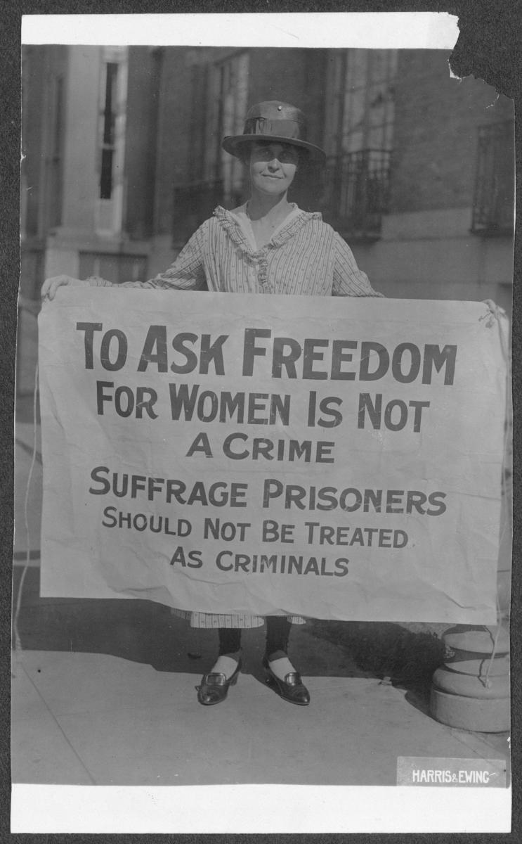 Mary Winsor, '17, holding Suffrage Prisoners banner.