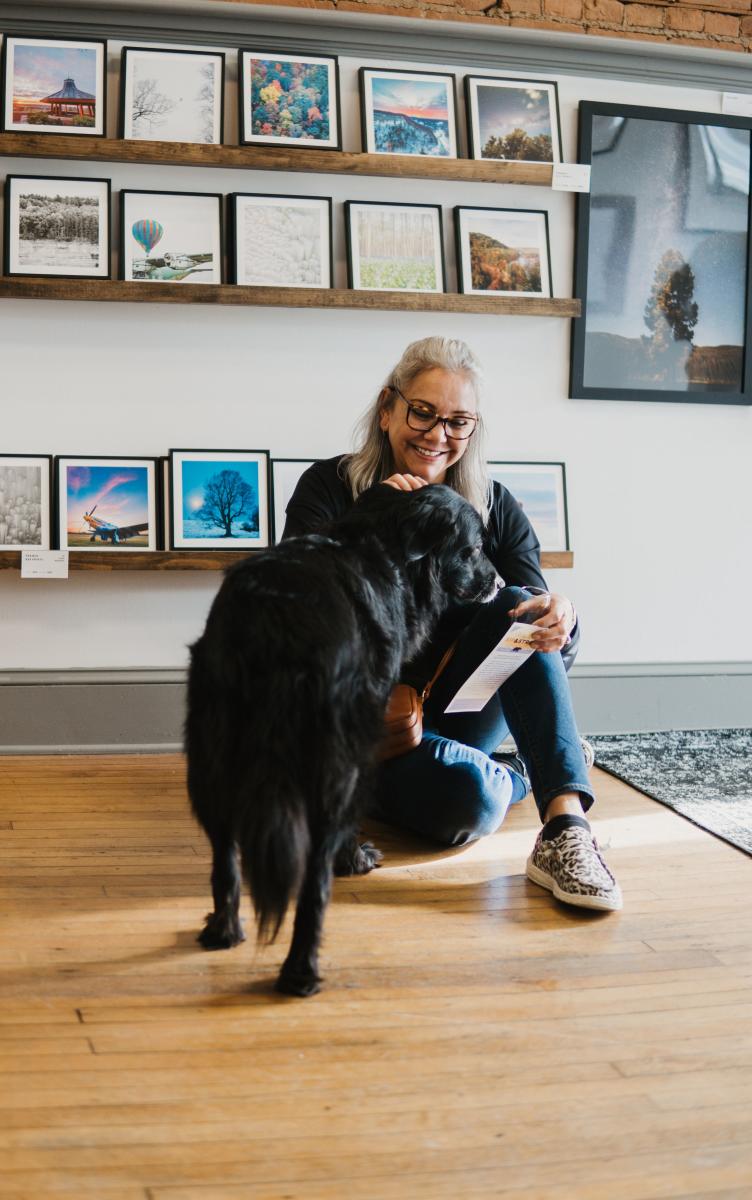 Woman at Gallery with Dog