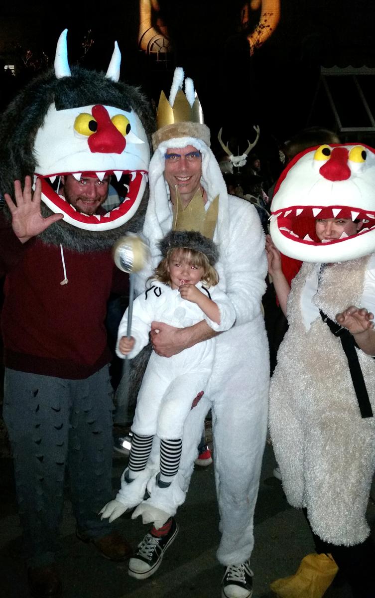 four people dressed in Wild Things inspired Halloween costumes