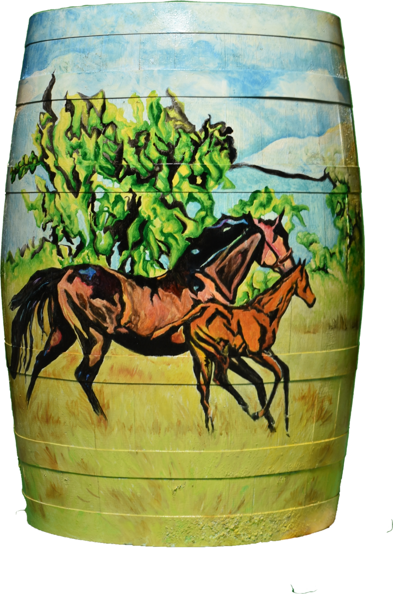 Bourbon Barrel painted with two horses on a green field with blue sky