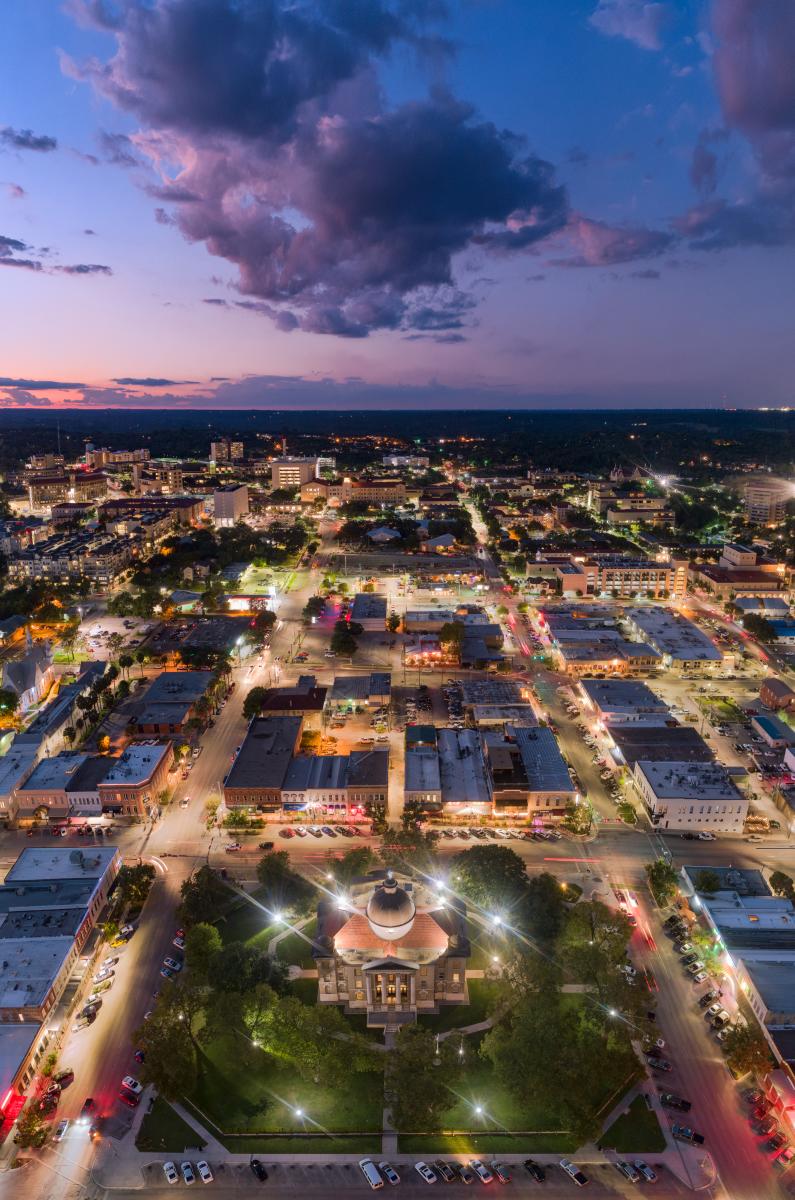 Aerial view of Downtown San Marcos, Texas at dusk