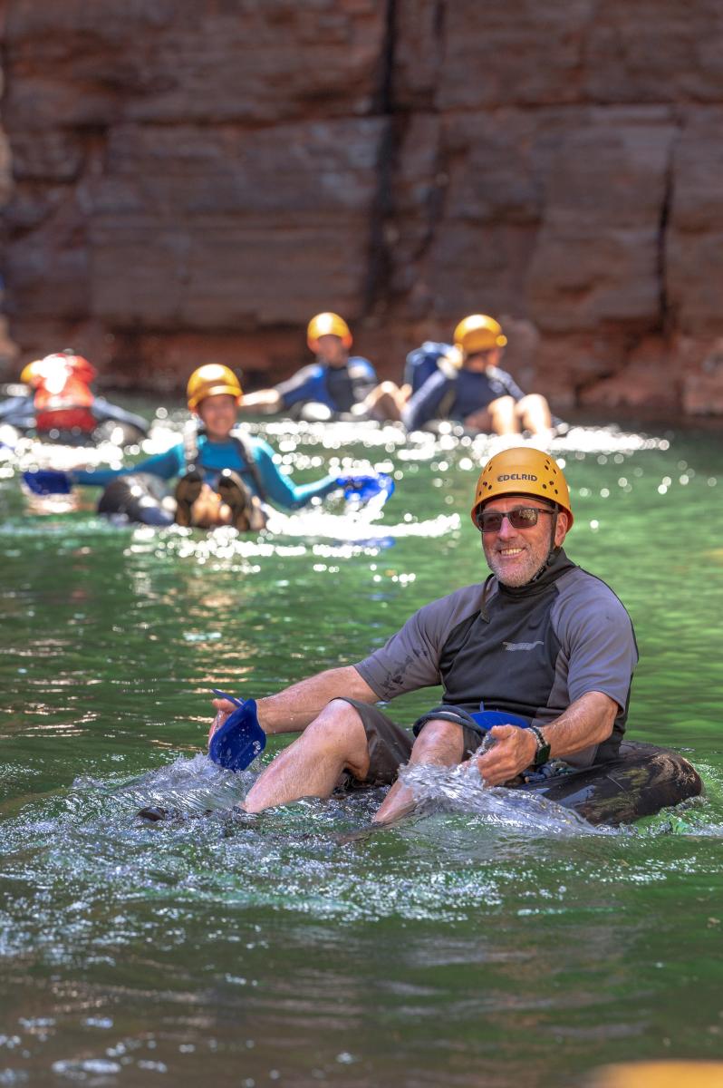 tubing through canyons with Spacechameleon Adventure Co