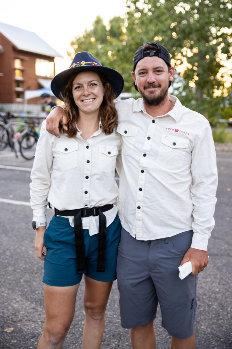 two people standing next to each other