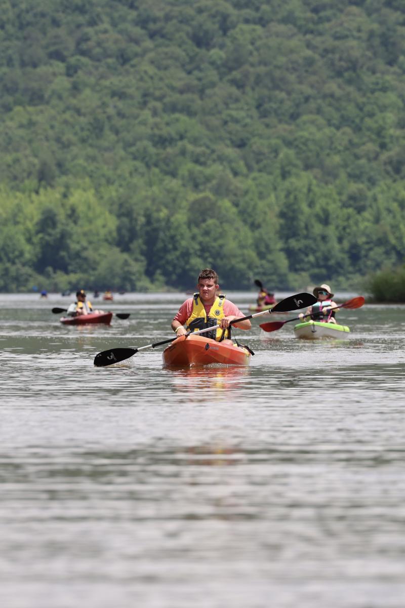 guy kayaking on the tennessee river line