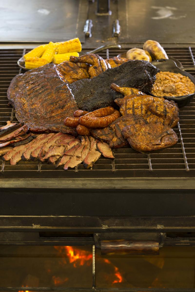 Brisket and sausages on a grill