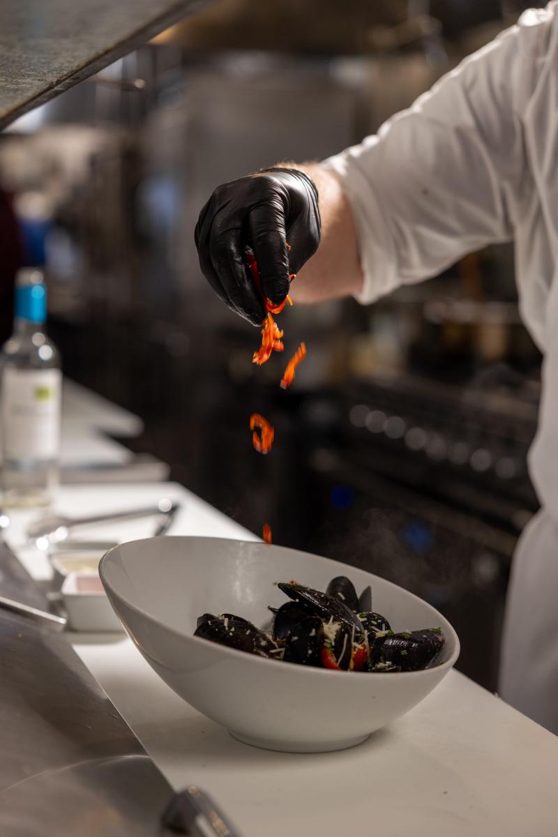 Mussels getting the finishing touch at Farlow's on the Water