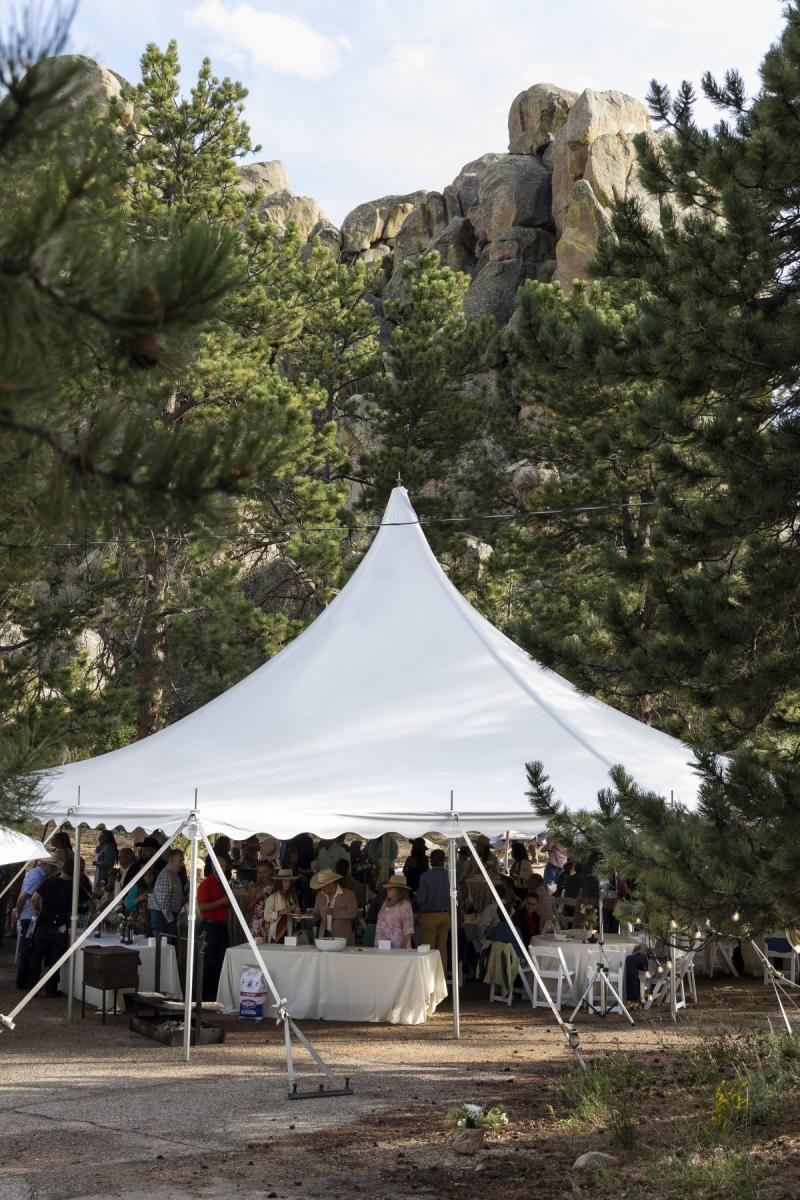 Hynds Lodge outdoor tent wedding at Curt Gowdy State Park, a fun and alternative wedding venue in Wyoming's scenic forest.
