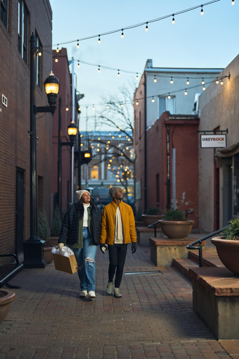Couple walking and shopping downtown in winter