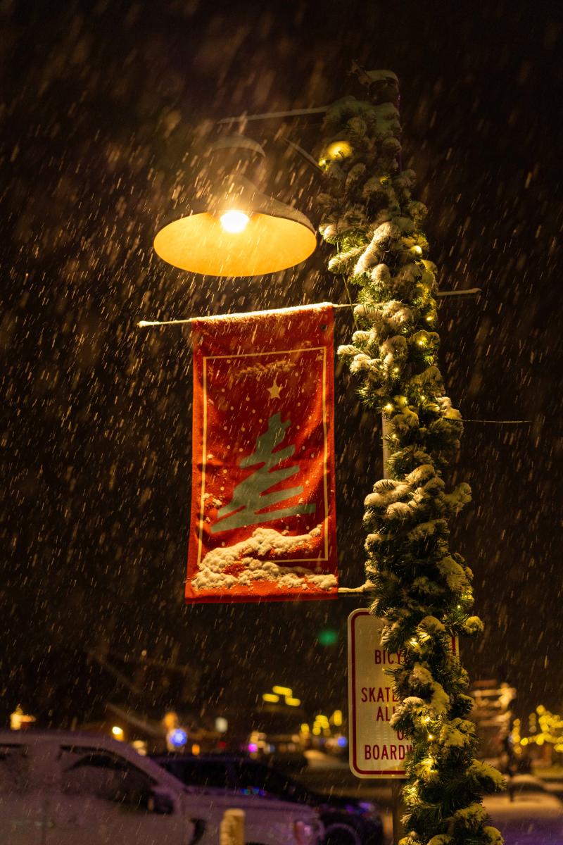 View of a lampost in the snow on a night in Grand Lake, Colorado