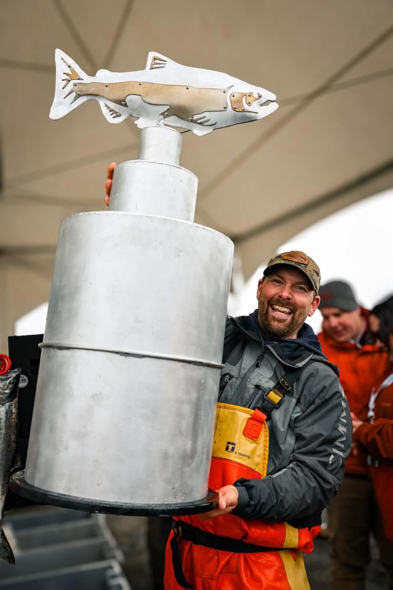 2024 Homer Winter King Salmon Tournament winner Chris Keithley holds up the trophy
