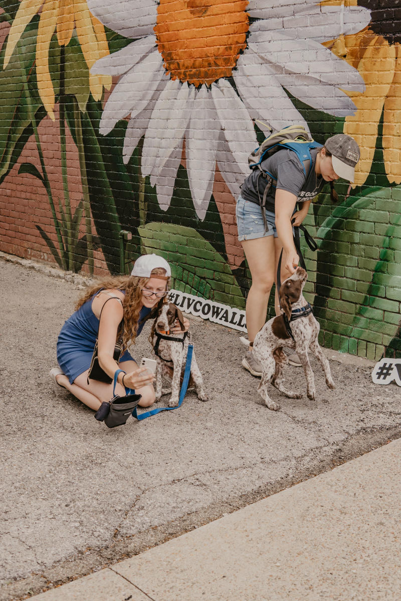 Girl Taking Selfie with Dog